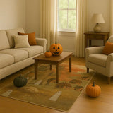 Cozy beige living room with Halloween pumpkins and a spooky autumn-themed rug featuring ghosts and houses