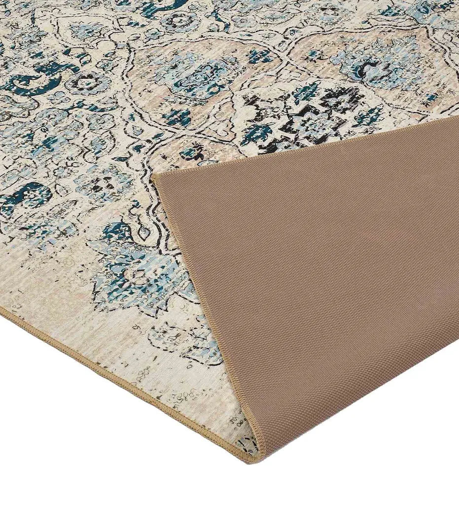 Soft ivory Persian patterned rug with antique effect.