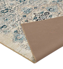 Soft ivory Persian patterned rug with antique effect.