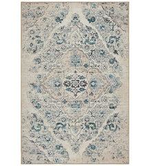 Ivory distressed Persian design rug with vintage-inspired detailing.
