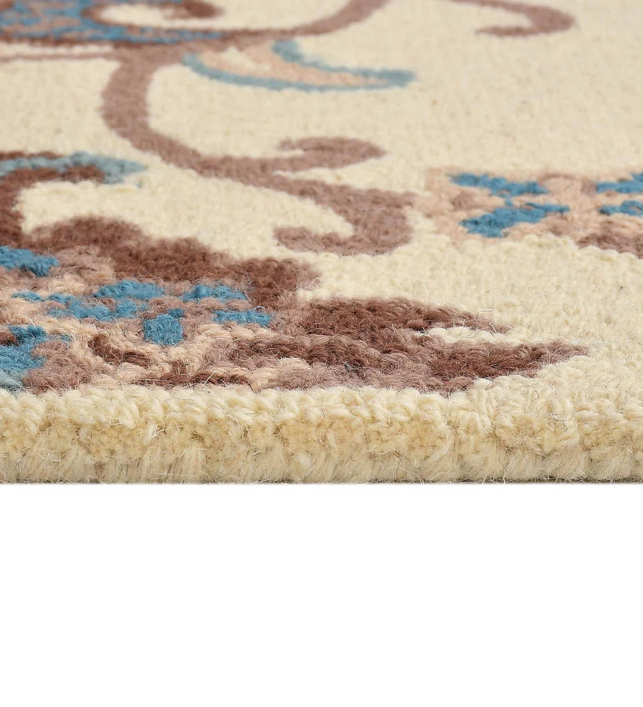 Classic ivory hand-tufted rug with Persian vine motif