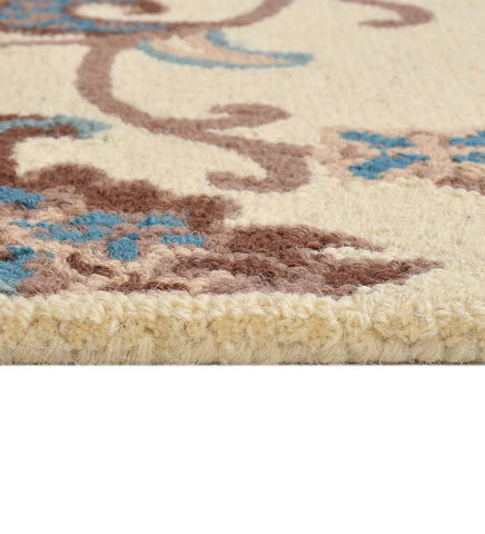 Classic ivory hand-tufted rug with Persian vine motif