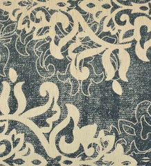 Vintage-style rug with faded design in ivory and charcoal.