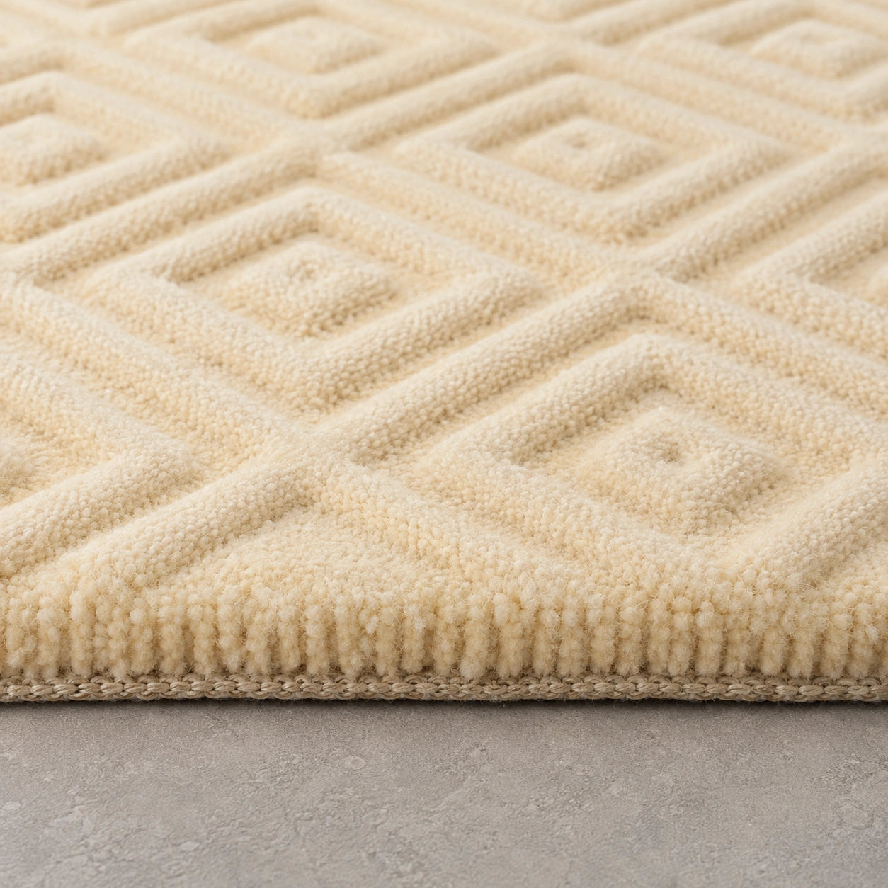 Ivory geometric textured wool rug