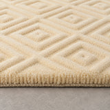 Ivory geometric textured wool rug