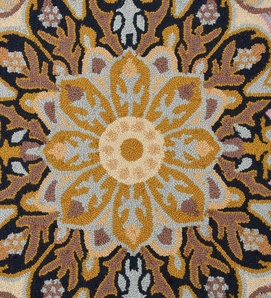 Luxury wool rug featuring ivory, gold, pink, and navy details