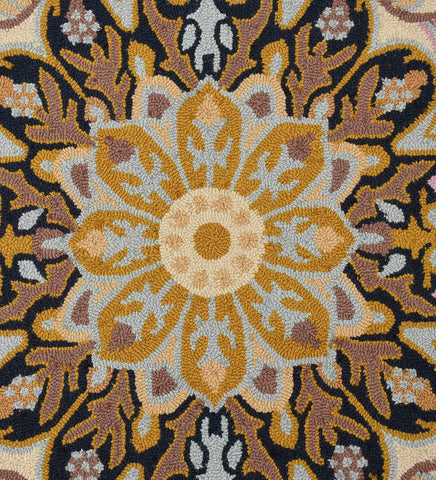 Luxury wool rug featuring ivory, gold, pink, and navy details