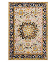 Ivory hand-tufted wool rug with golden floral medallion and navy border