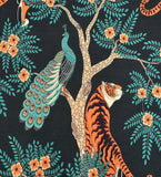 Luxury handwoven rug with jungle theme featuring vibrant tiger, peacock, and floral tree design