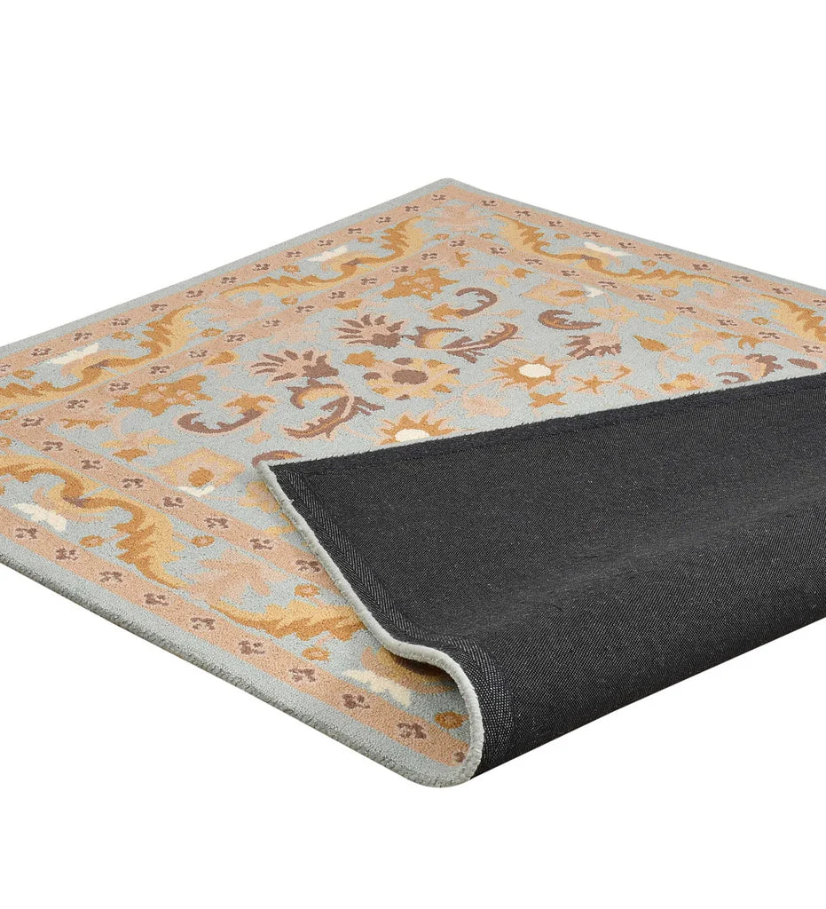 Classic medallion rug in light blue and beige for living room.