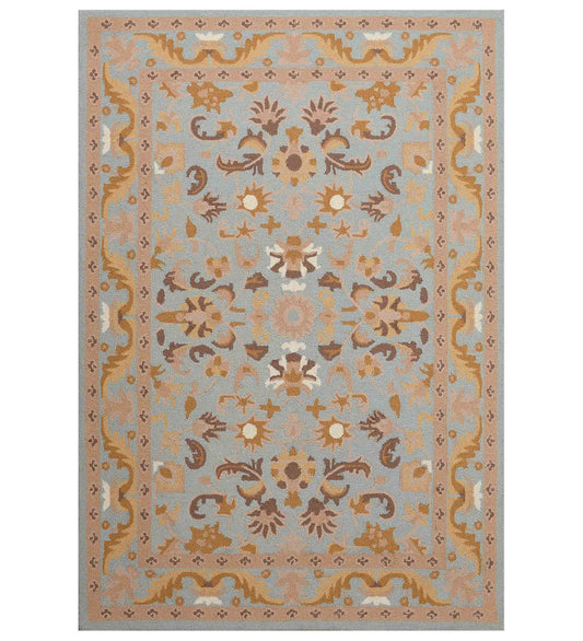 Light blue and beige traditional rug with floral medallion design.