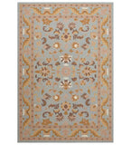 Light blue and beige traditional rug with intricate floral and geometric pattern