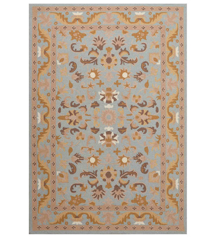 Light blue and beige traditional rug with floral medallion design.
