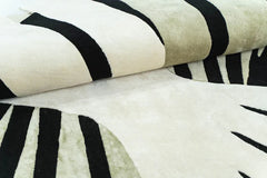 Handcrafted oval designer rug made from premium wool.