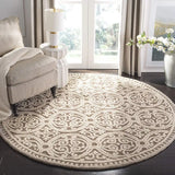 Luxury round wool rug in beige tones for living rooms.