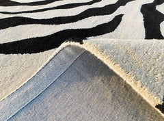 Luxury animal pattern hand-tufted wool rug.