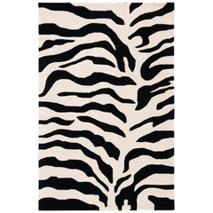 Black and ivory zebra print hand-tufted wool rug.