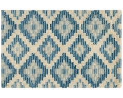 Luxury blue geometric diamond rug for modern interiors.