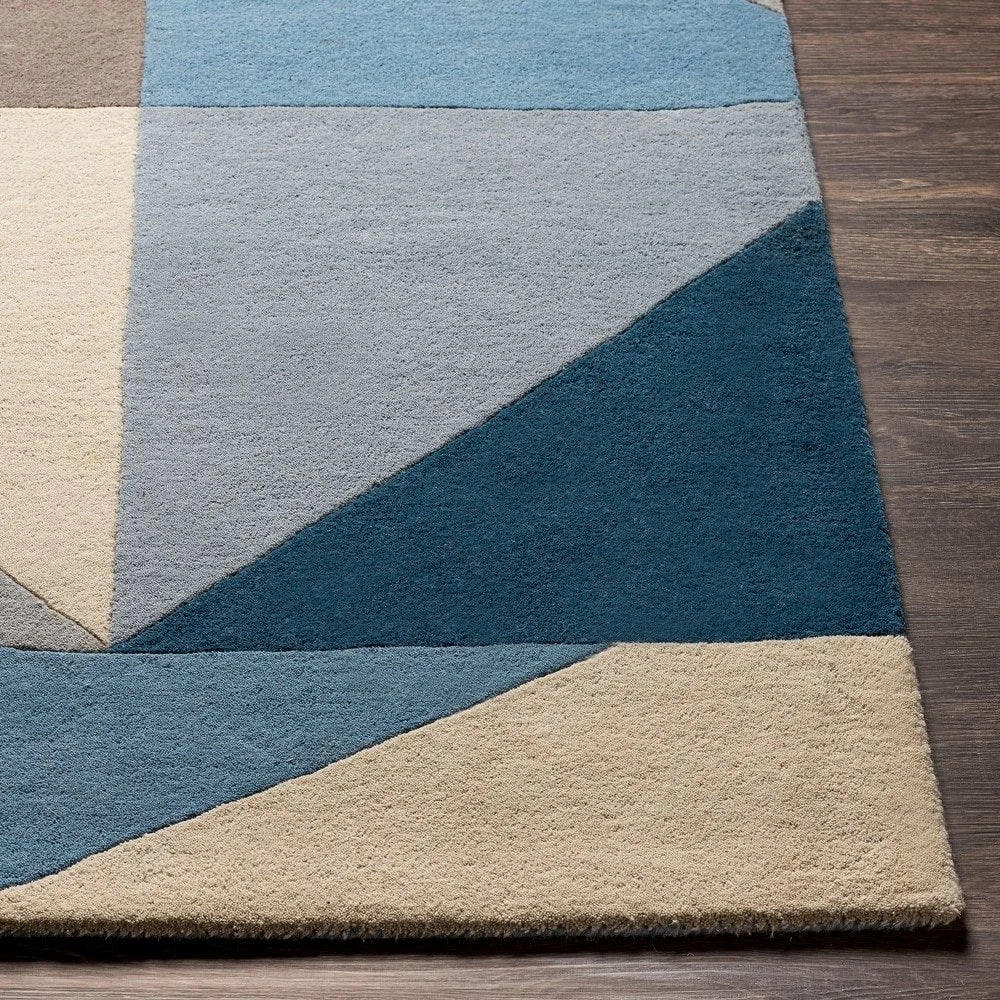Handmade wool rug with geometric pattern for living room.