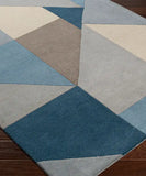 Premium hand-tufted geometric rug in blue and beige.