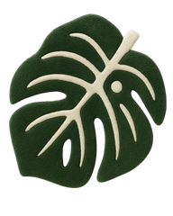 Tropical monstera leaf rug for living room decor in premium wool.