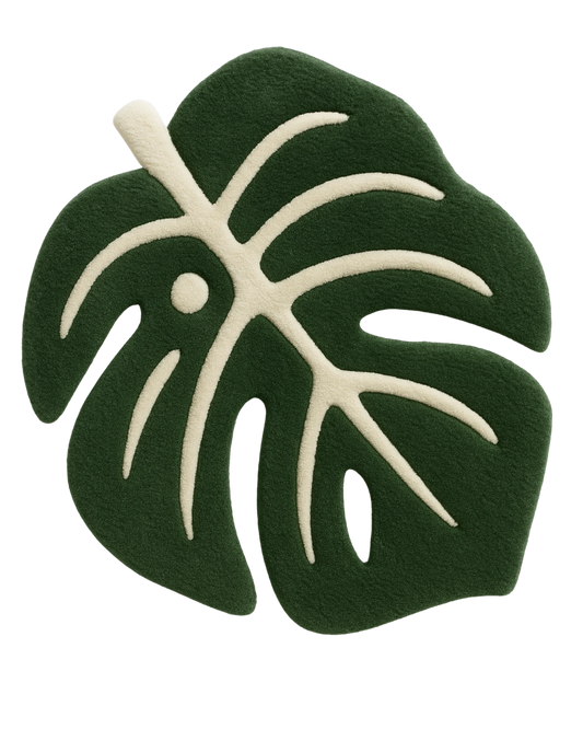 Luxury green and cream monstera leaf rug – hand-tufted wool design.