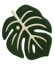 Luxury green and cream monstera leaf rug – hand-tufted wool design.