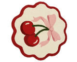 Luxury round cherry rug featuring twin red cherries and a pink bow.