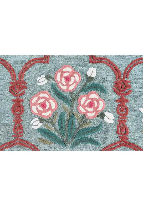 Hand-tufted floral pattern rug with detailed blossoms.