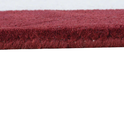 Contemporary red bordered wool rug for modern interiors