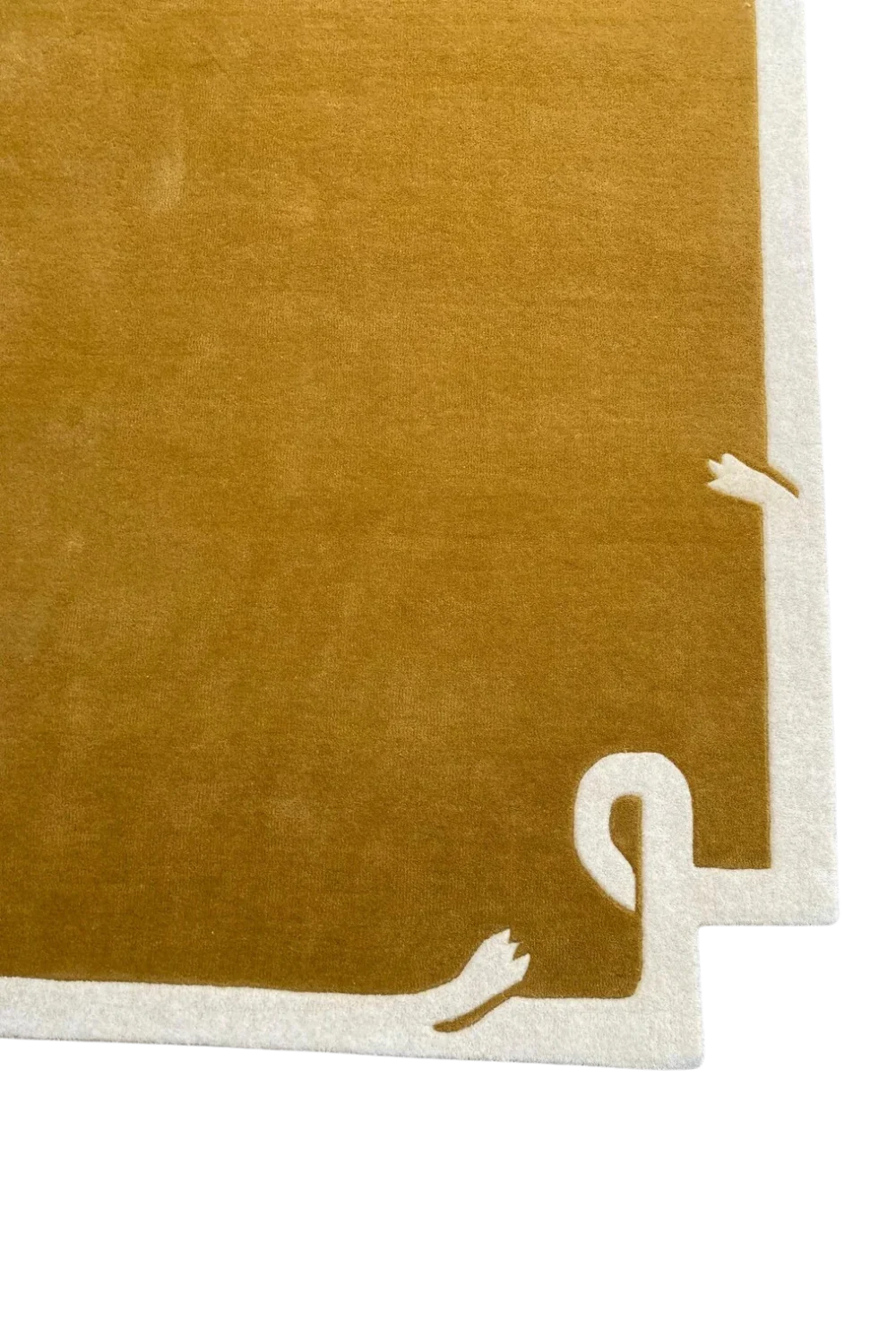 Minimalist rectangular rug with artistic ivory edge patterns.