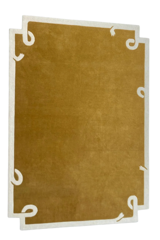 Hand-tufted wool rug in warm camel tone for modern living room.