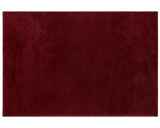 Elegant cherry red wool rug with soft texture and rich color depth.