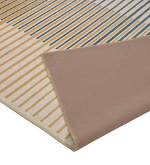 Durable gradient patterned rug for modern living spaces.