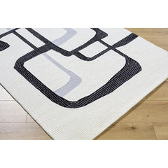white and black rug
