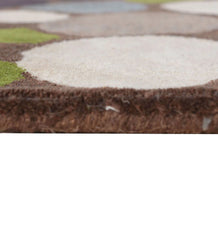 Contemporary pebble pattern rug in grey, ivory, brown, and green