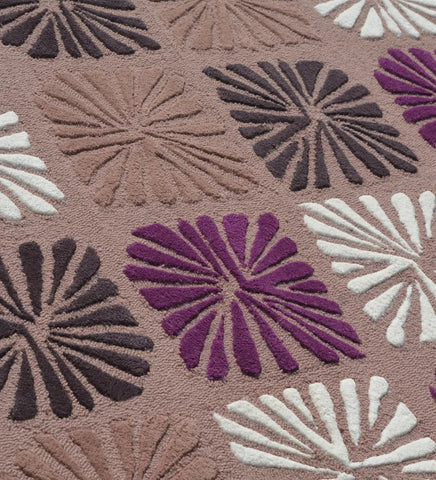 Luxury wool rug with purple, taupe, and white block floral design