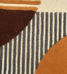 Luxury abstract rug featuring gold and brown geometric accents 