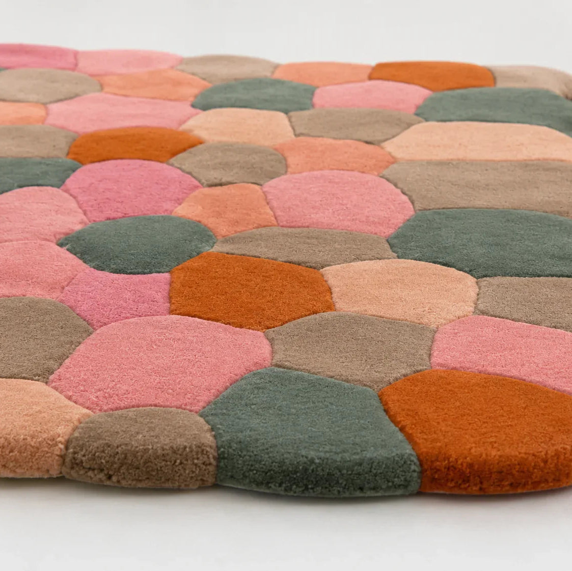 Multicolored textured rug on a white background
