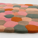 Multicolored textured rug on a white background