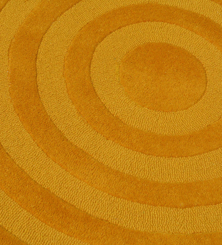 Luxury yellow hand-tufted rug with textured circle pattern