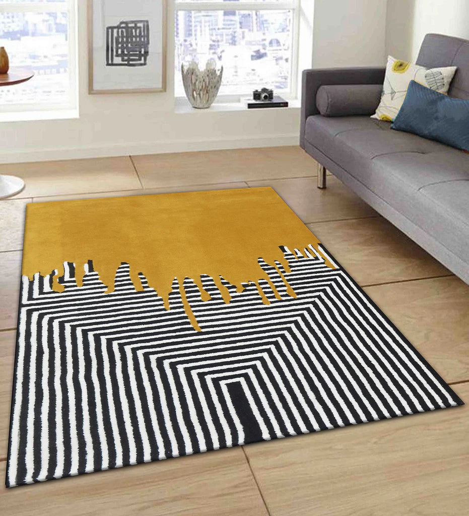 Luxury mustard wool rug featuring bold paint-drip pattern and black white lines.
