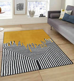 Luxury mustard wool rug featuring bold paint-drip pattern and black white lines.