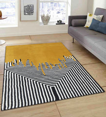 Luxury mustard wool rug featuring bold paint-drip pattern and black white lines.