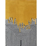 Mustard yellow and black hand-tufted wool area rug with geometric drip art design.