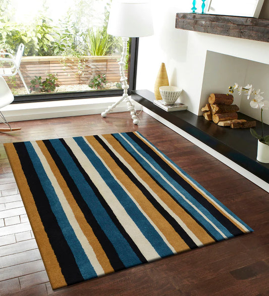 Luxury striped wool rug featuring teal, mustard, ivory, and black tones.