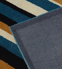 Contemporary wool rug with mustard and teal stripes for living room décor.
