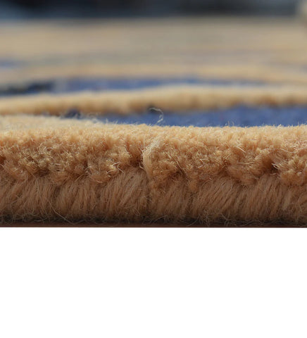 Geometric navy and beige wool rug for modern interiors