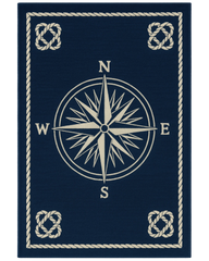 Navy blue and beige nautical rug with compass design.