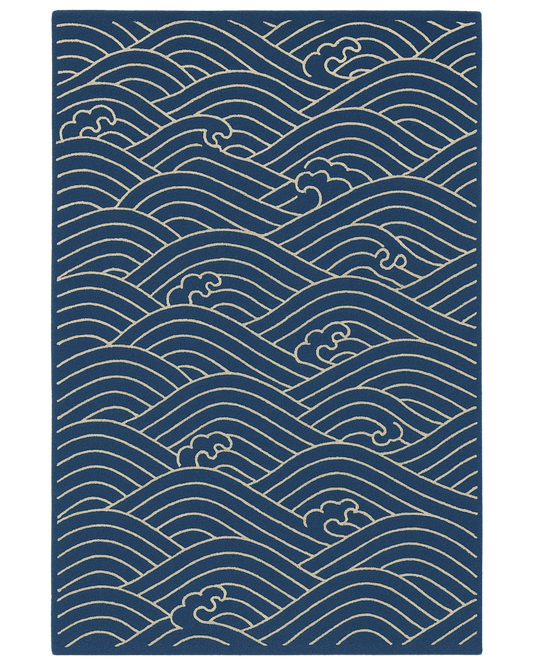Navy blue and ivory hand-tufted nautical rug with ocean wave pattern.
